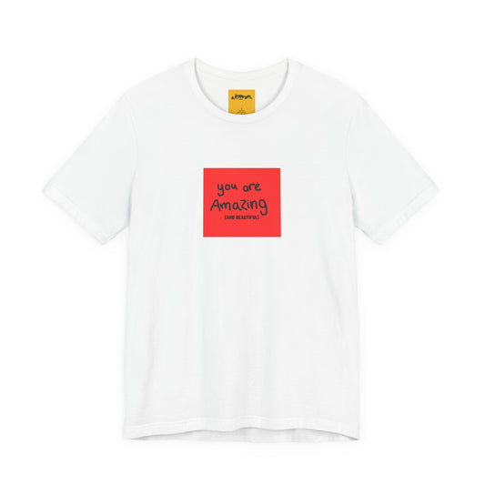white t-shirt with a red square and text reads you are amazing and beautiful on a white background