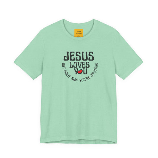 mint green JESUS LOVES YOU BUT RIGHT NOW YOU'RE ANNOYING funny faith tee with humorous message - close-up detail of graphic design