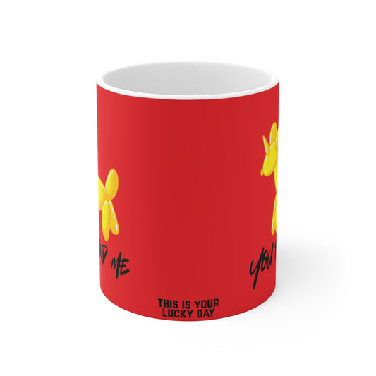 Red mug with yellow unicorn designs and text on a white background with text this is your lucky day
