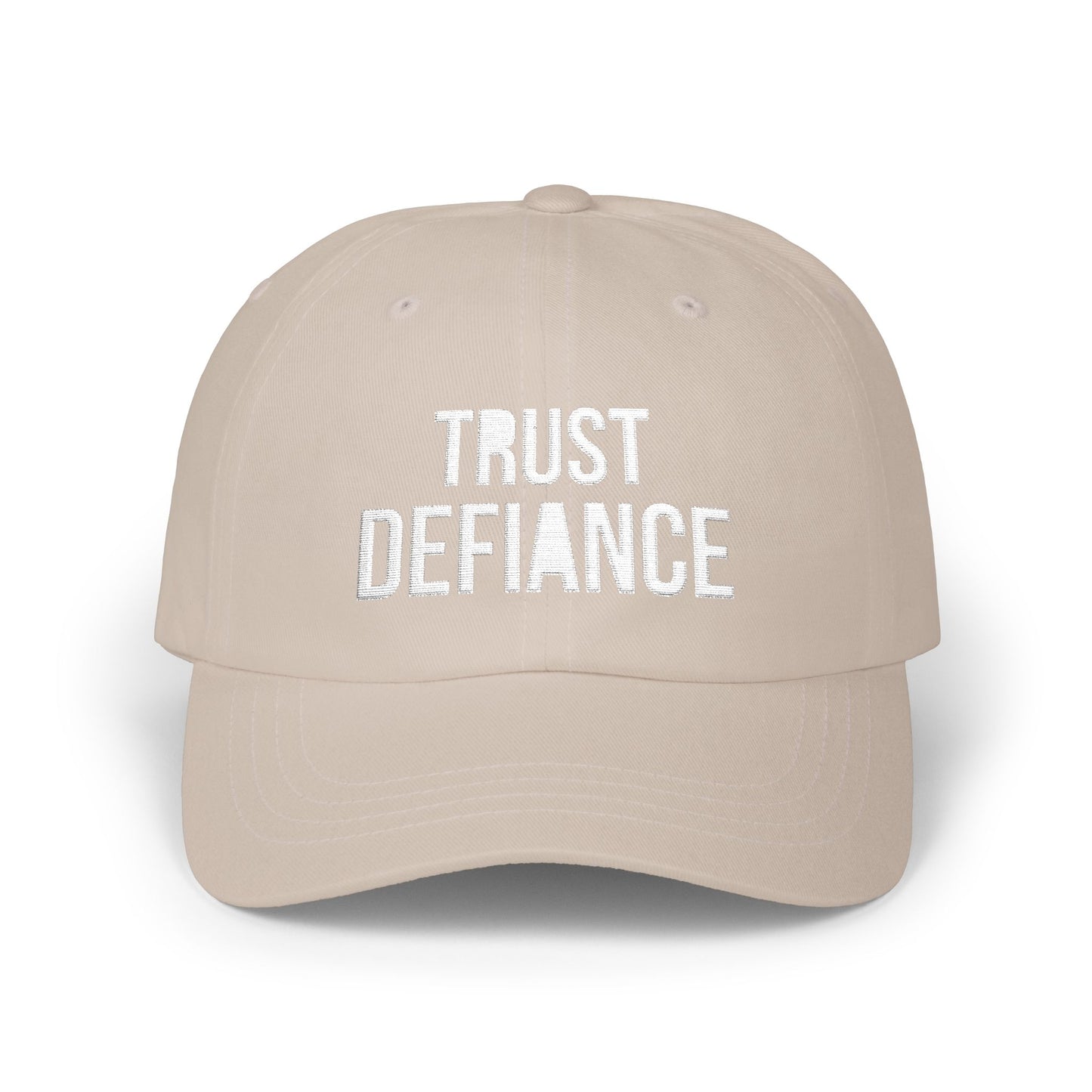 beige classic dad cap with white embroidered TRUST DEFIANCE text - unstructured cotton hat