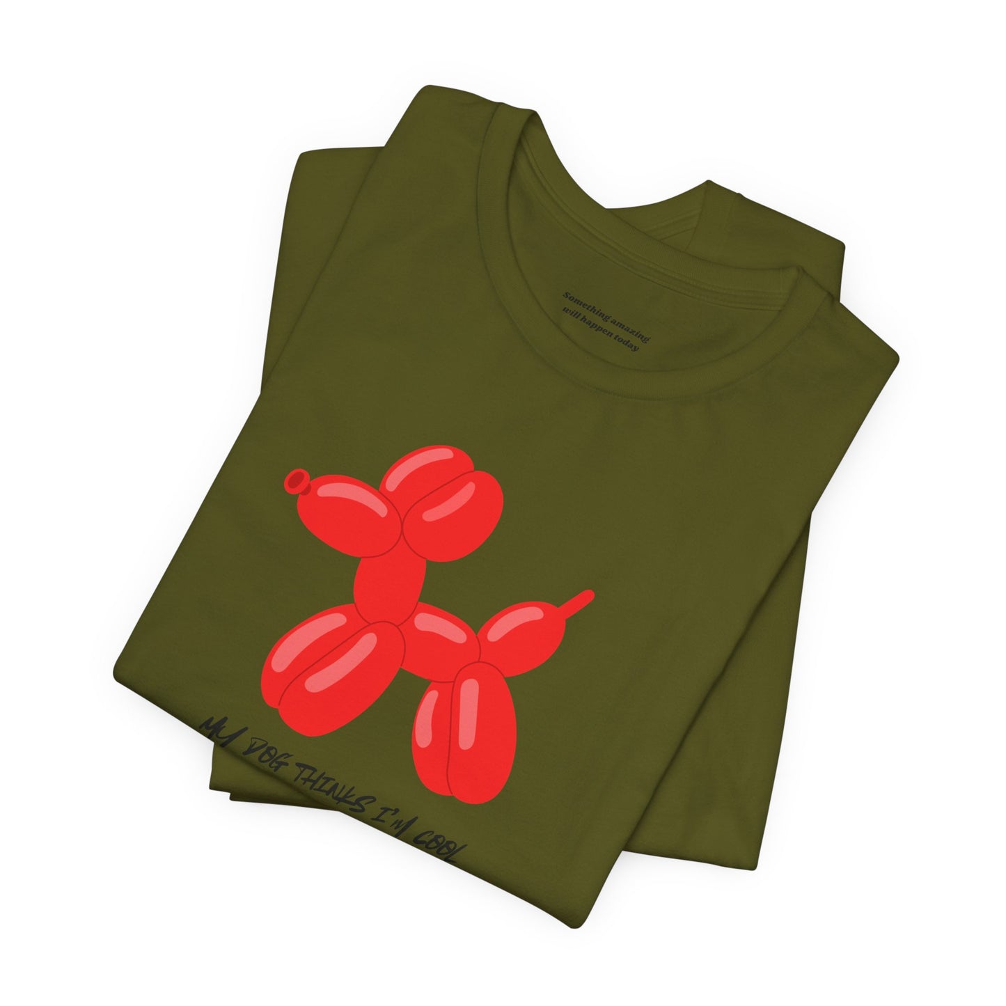 folded green Close-up of red balloon animal dog graphic on white cotton tee - playful dog design
