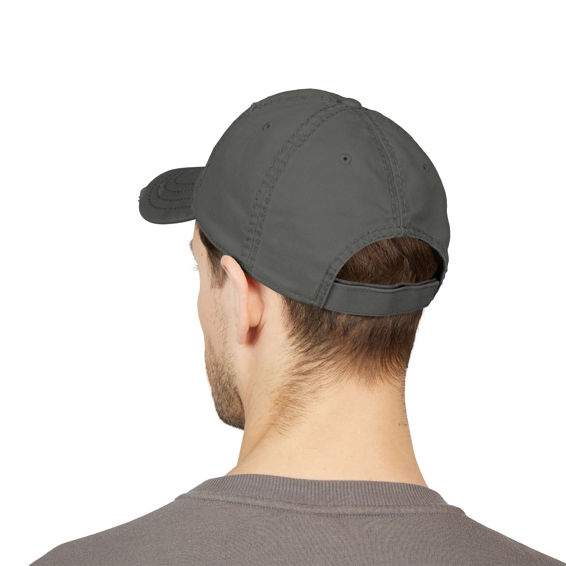 Gray cap worn by a person on a white background