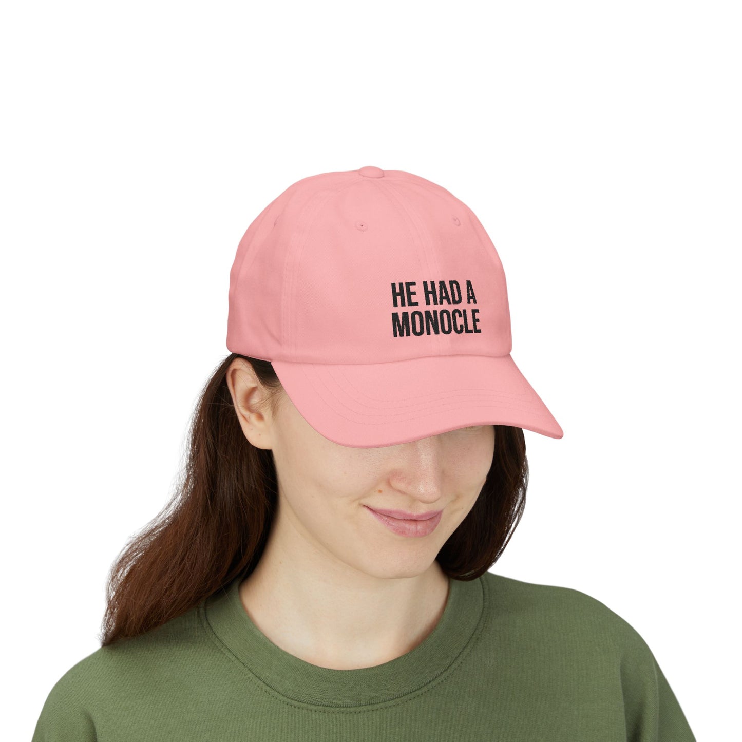 Person wearing a pink cap with text on a white background