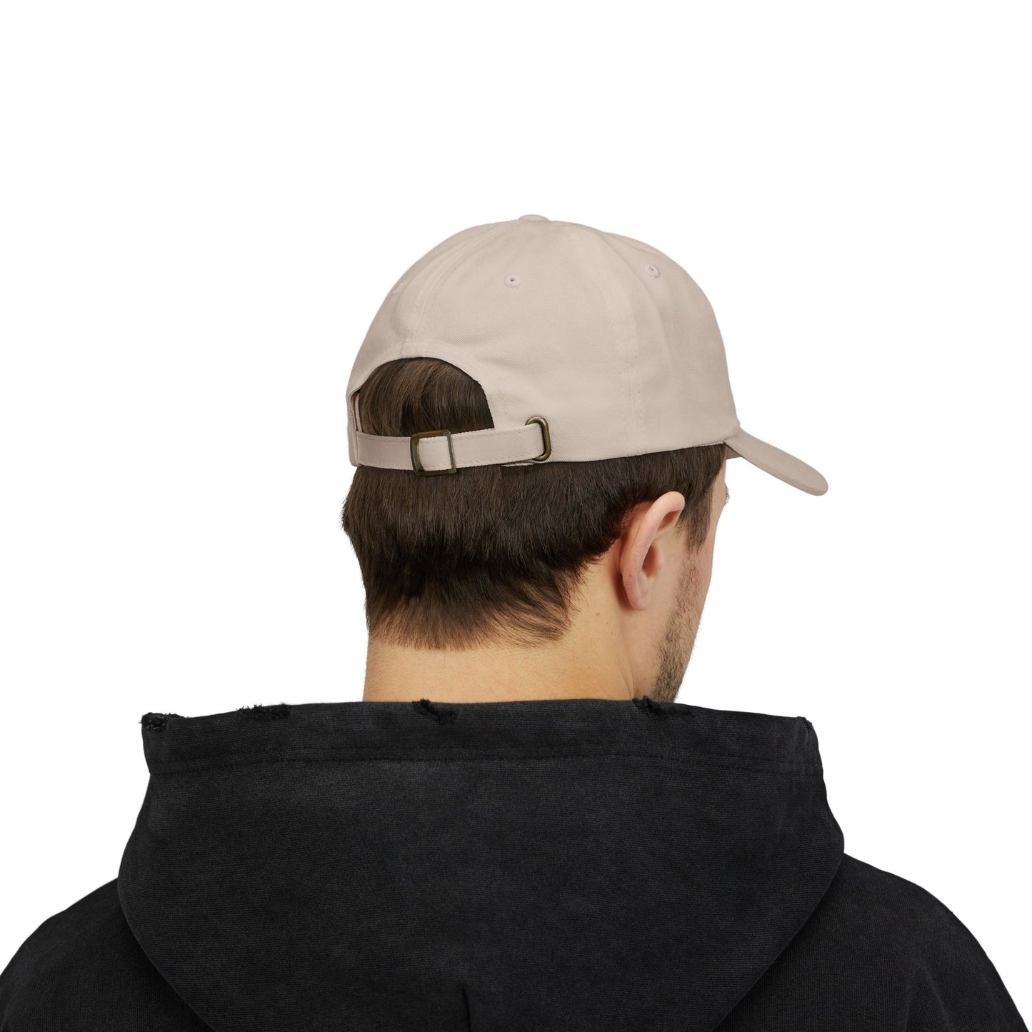 Person wearing a beige cap from behind on a white background