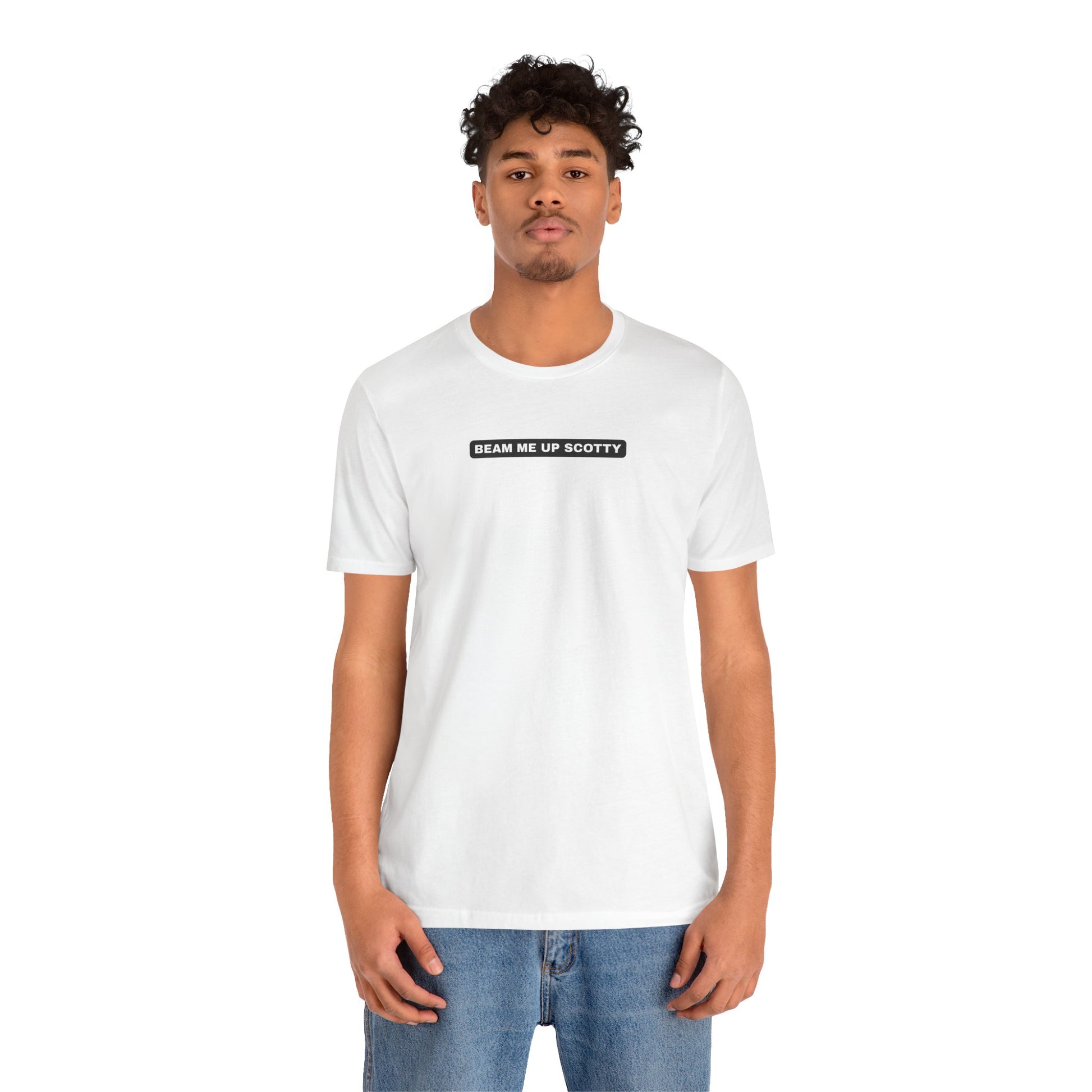 Male model wearing white  Beam Me Up Scotty Mandela Effect t-shirt untucked, casual retail fit, Bella Canvas 3001 unisex tee