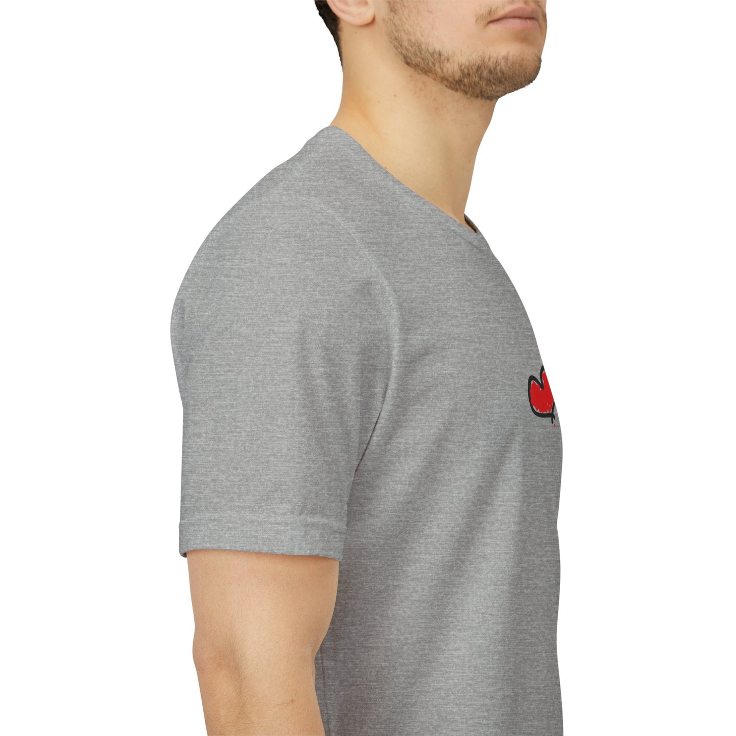 Gray t-shirt with a red logo on the sleeve worn by a person side view