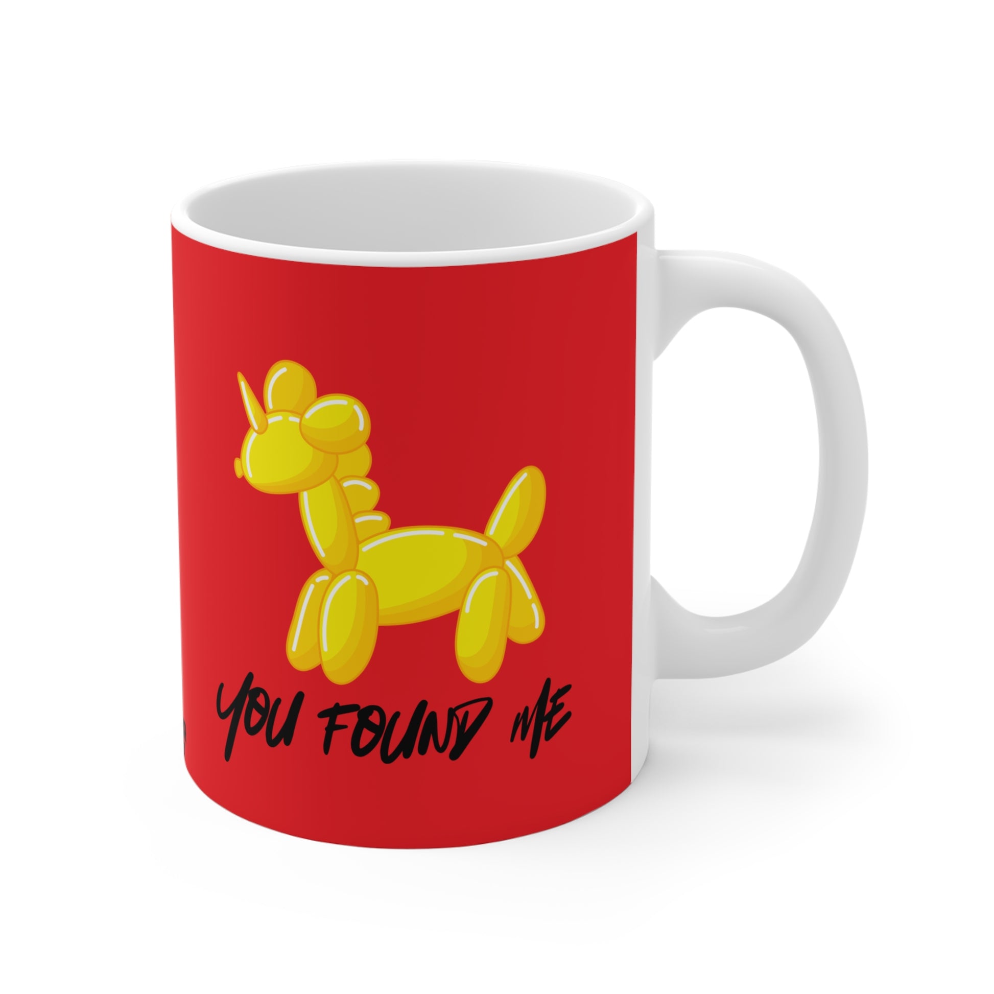Red mug with yellow unicorn designs and text on a white background
