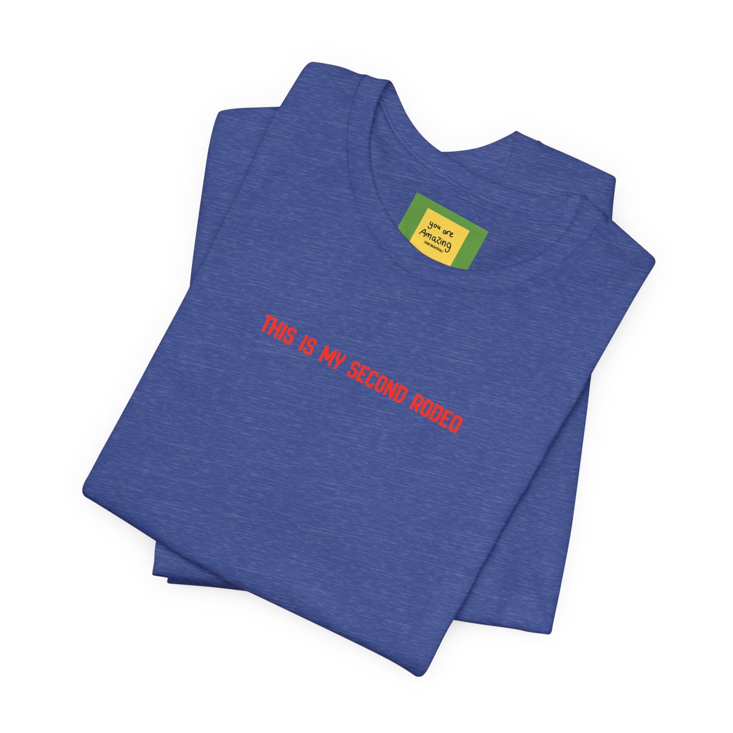 folded This Is My Second Rodeo western cowboy cowgirl t-shirts in white, casual rodeo apparel with yellow neck label  that says You Are Amazing And Beautiful positivity
