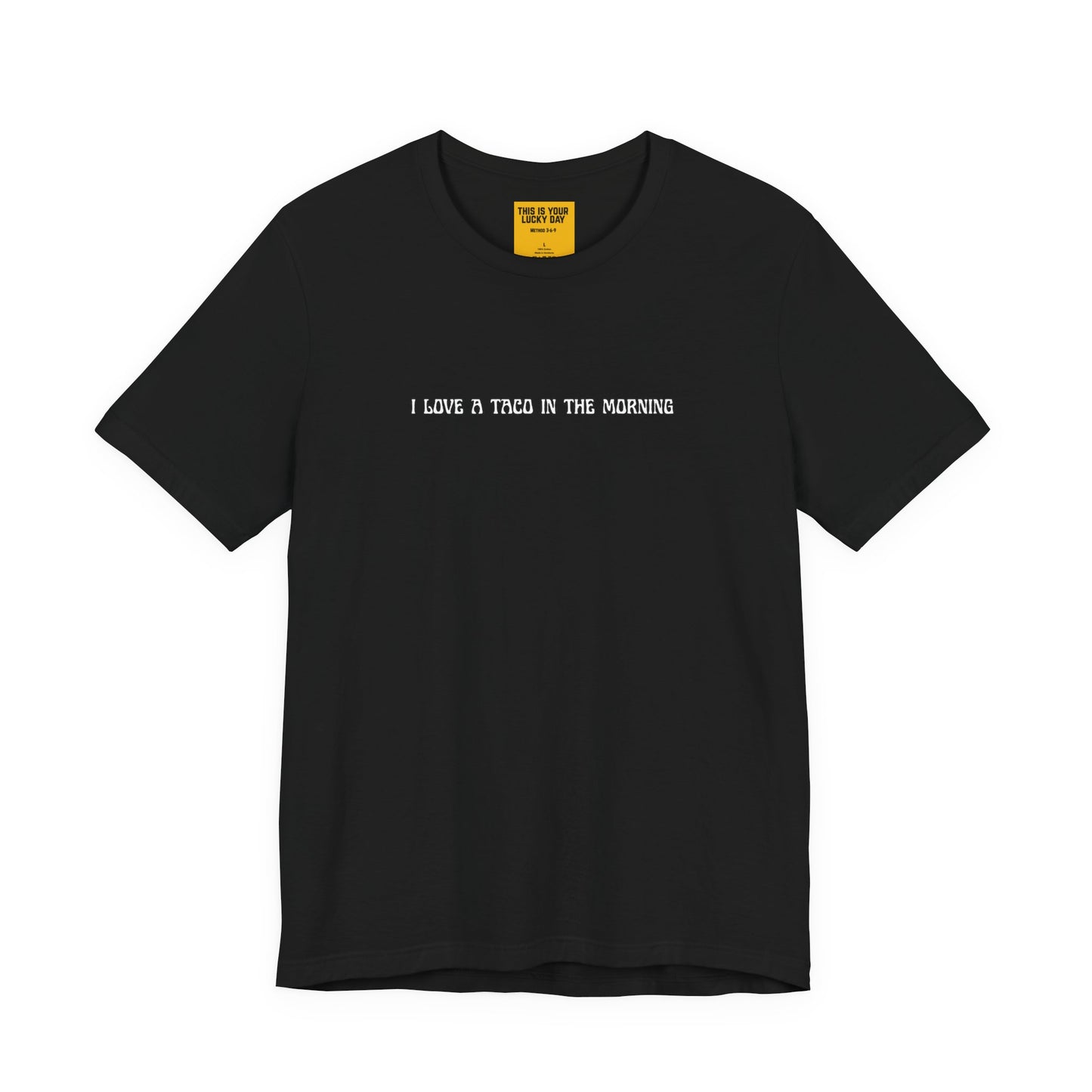 black t-shirt with white text 'I LOVE A TACO IN THE MORNING' 