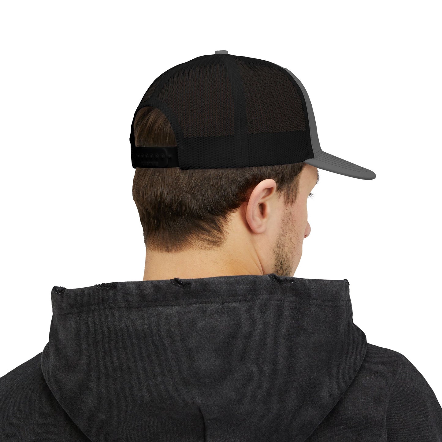 Person wearing a black and gray cap from behind on a white background