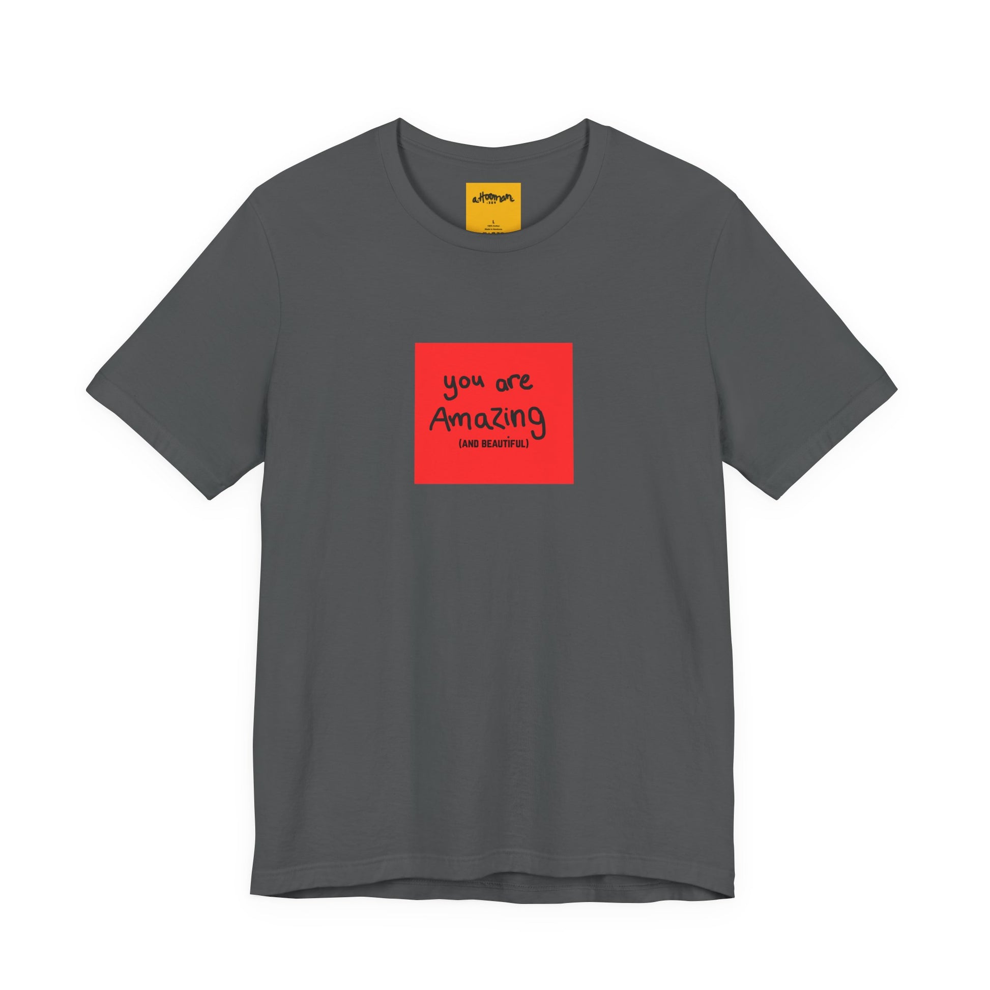 grey t-shirt with a red square and text  reads you are amazing and beautiful on a white background