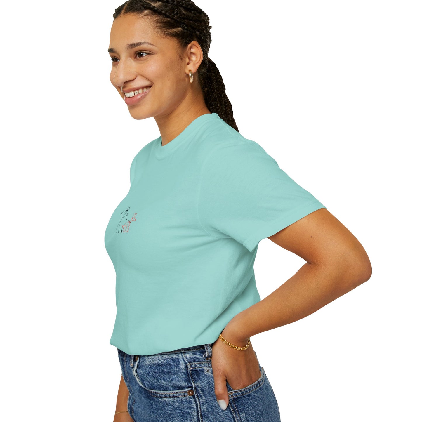 Woman wearing a light blue t-shirt and jeans on a white background