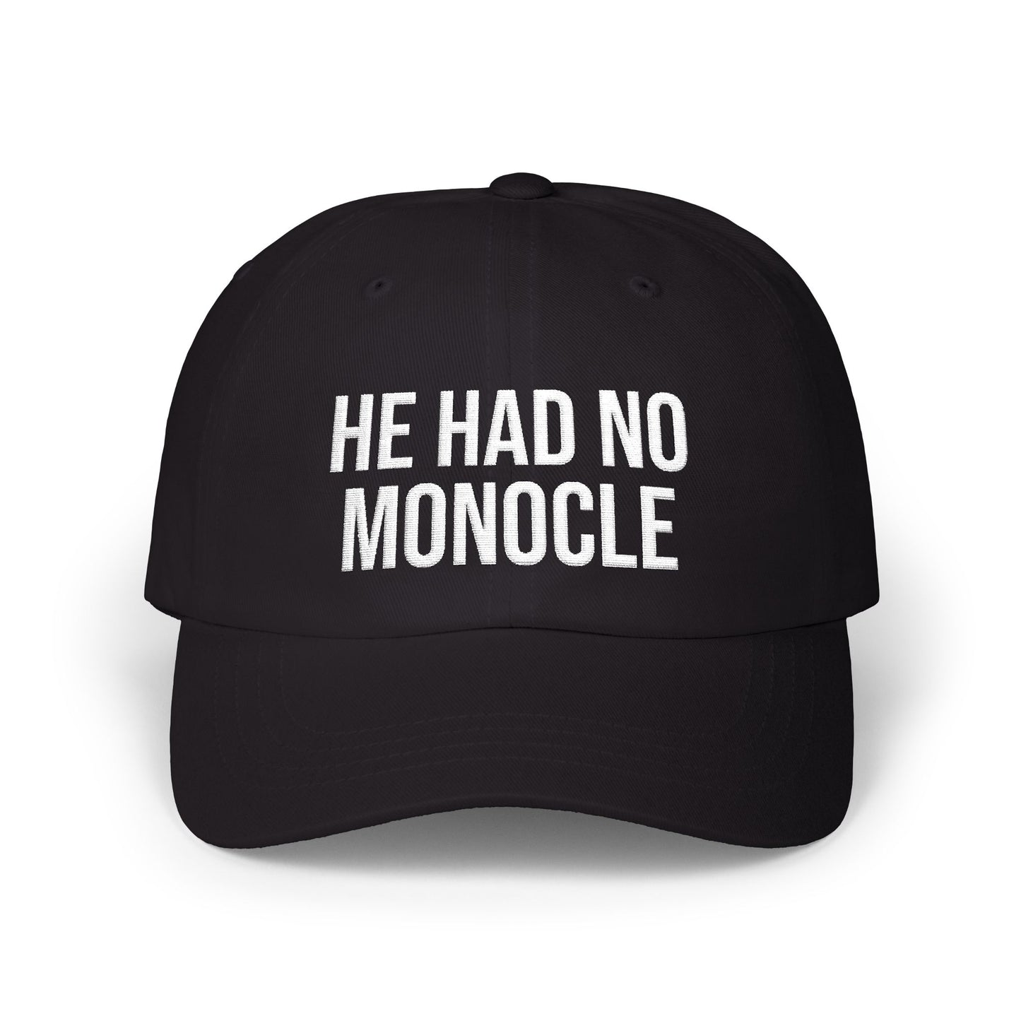 Black cap with white text 'HE HAD NO MONOCLE' on a white background