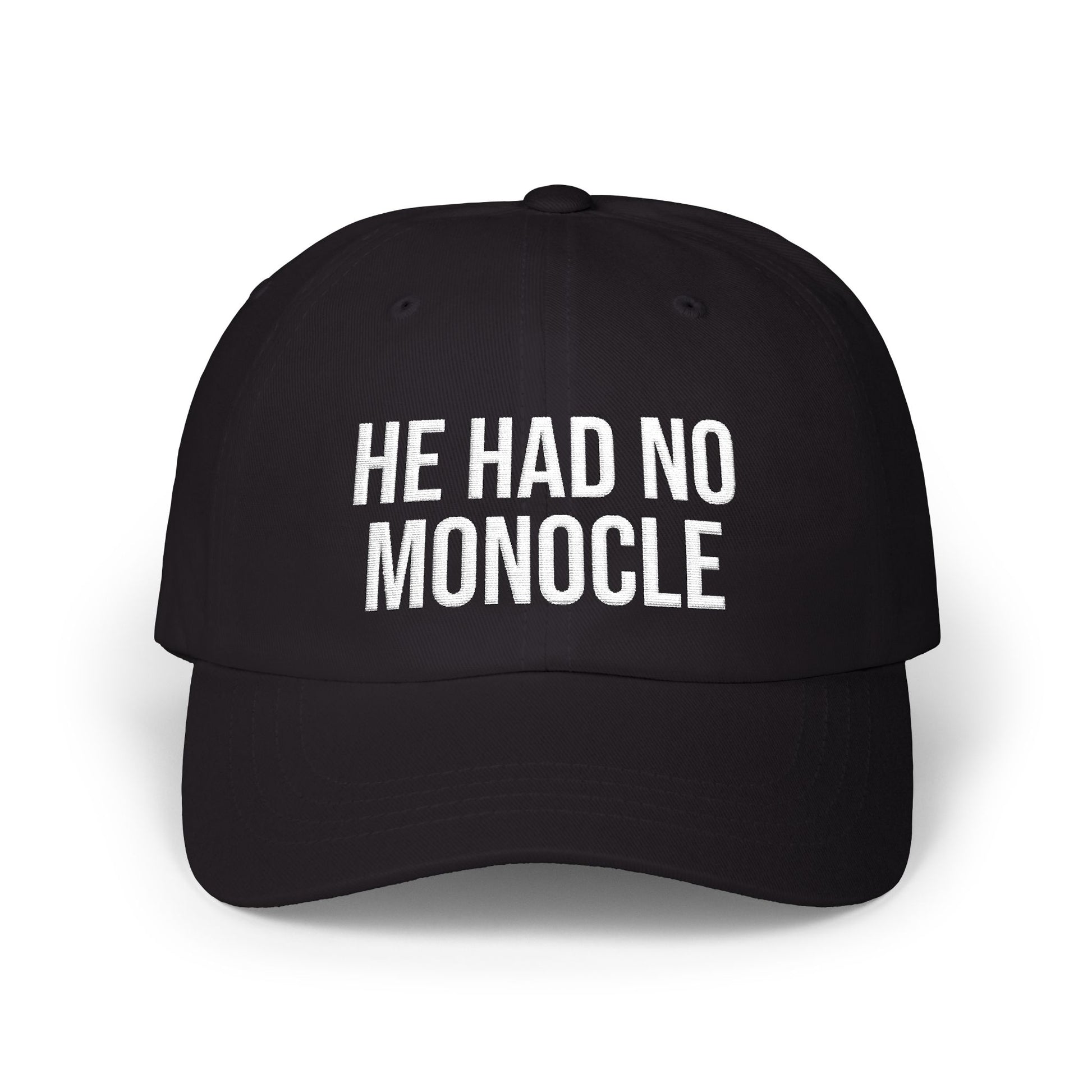 Black cap with white text 'HE HAD NO MONOCLE' on a white background