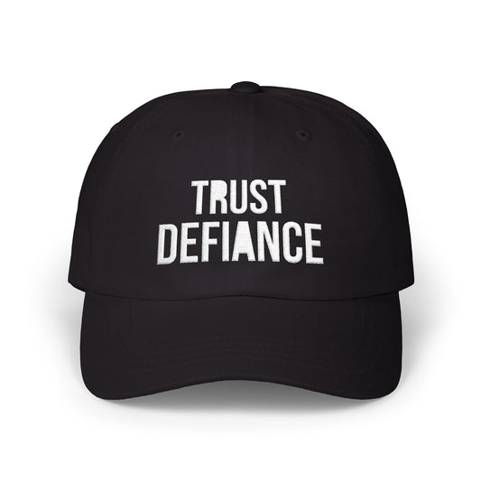 black classic dad cap with white embroidered TRUST DEFIANCE text - unstructured cotton hat
